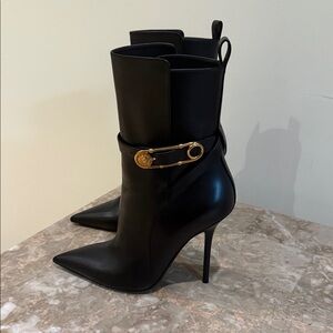 Versace Black Heeled Boots with Gold Medusa Pin . (Kept them New)